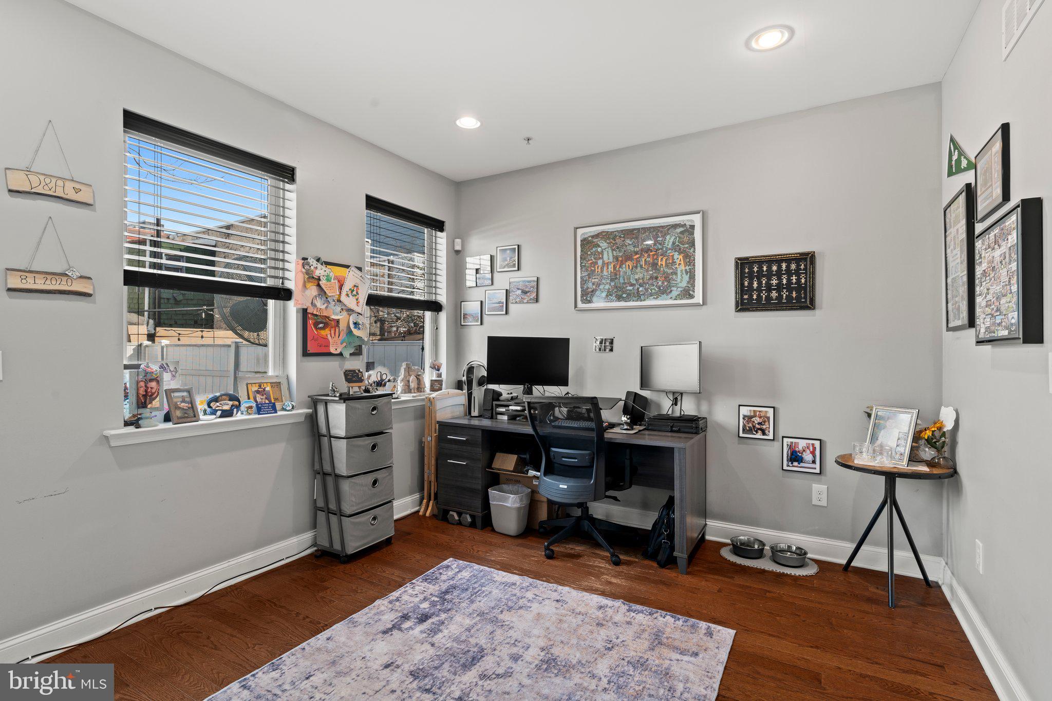 2115 Carpenter Street, Unit 1 Philadelphia, PA 19146 - Photo 13 of 24 a view of a workspace with furniture and toys
