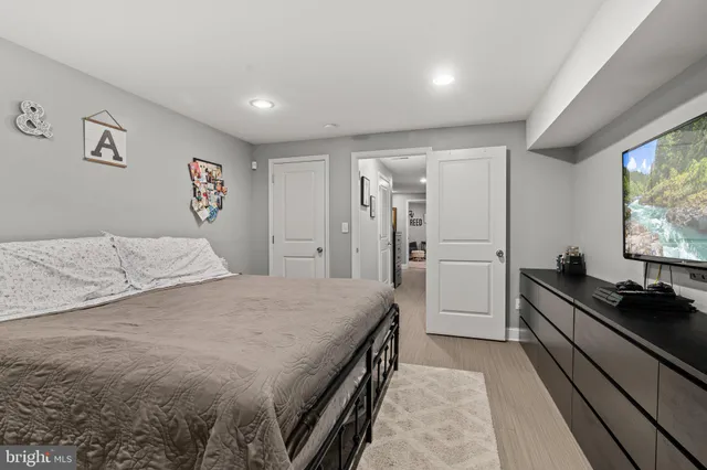a bathroom with a sink toilet and mirror