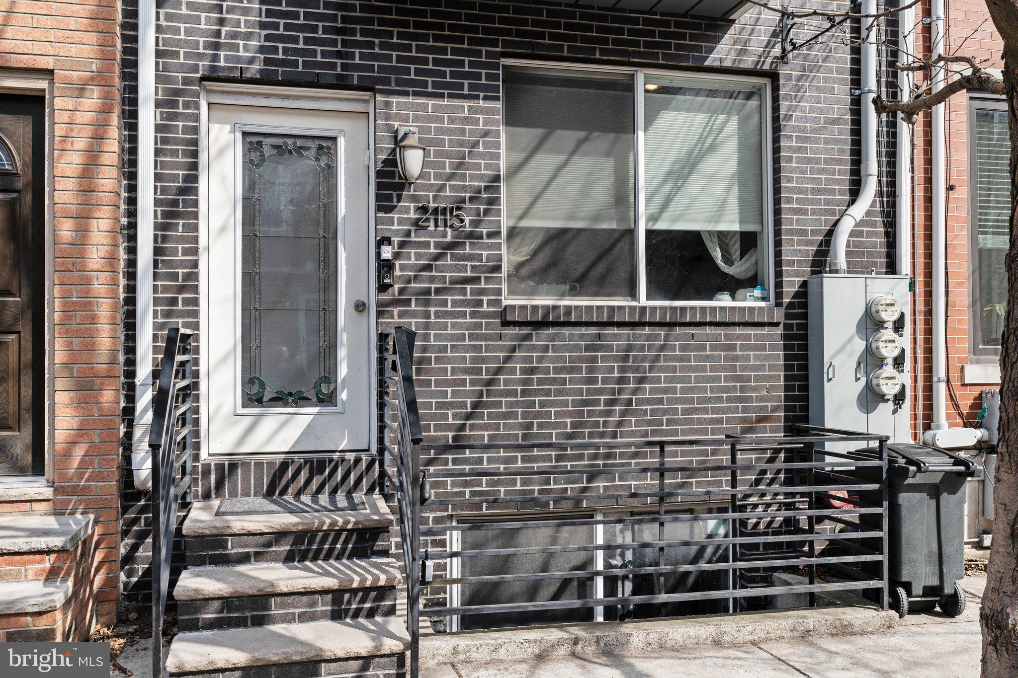 2115 Carpenter Street, Unit 1 Philadelphia, PA 19146 - Photo 3 of 24 a view of front door and porch