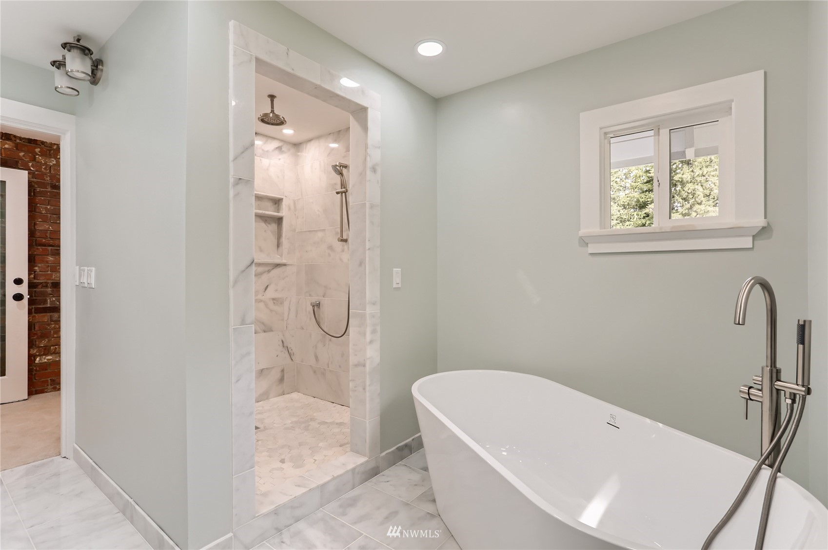19810 43rd Avenue Southeast Bothell, WA 98012 - Photo 18 of 40 a bathroom with a bathtub and shower