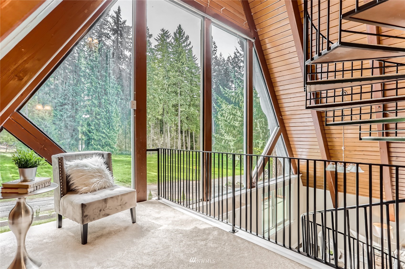 19810 43rd Avenue Southeast Bothell, WA 98012 - Photo 20 of 40 a balcony with furniture and wooden deck