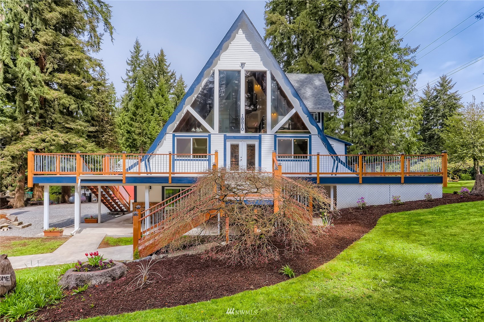 19810 43rd Avenue Southeast Bothell, WA 98012 - Photo 2 of 40 a front view of a house with a yard