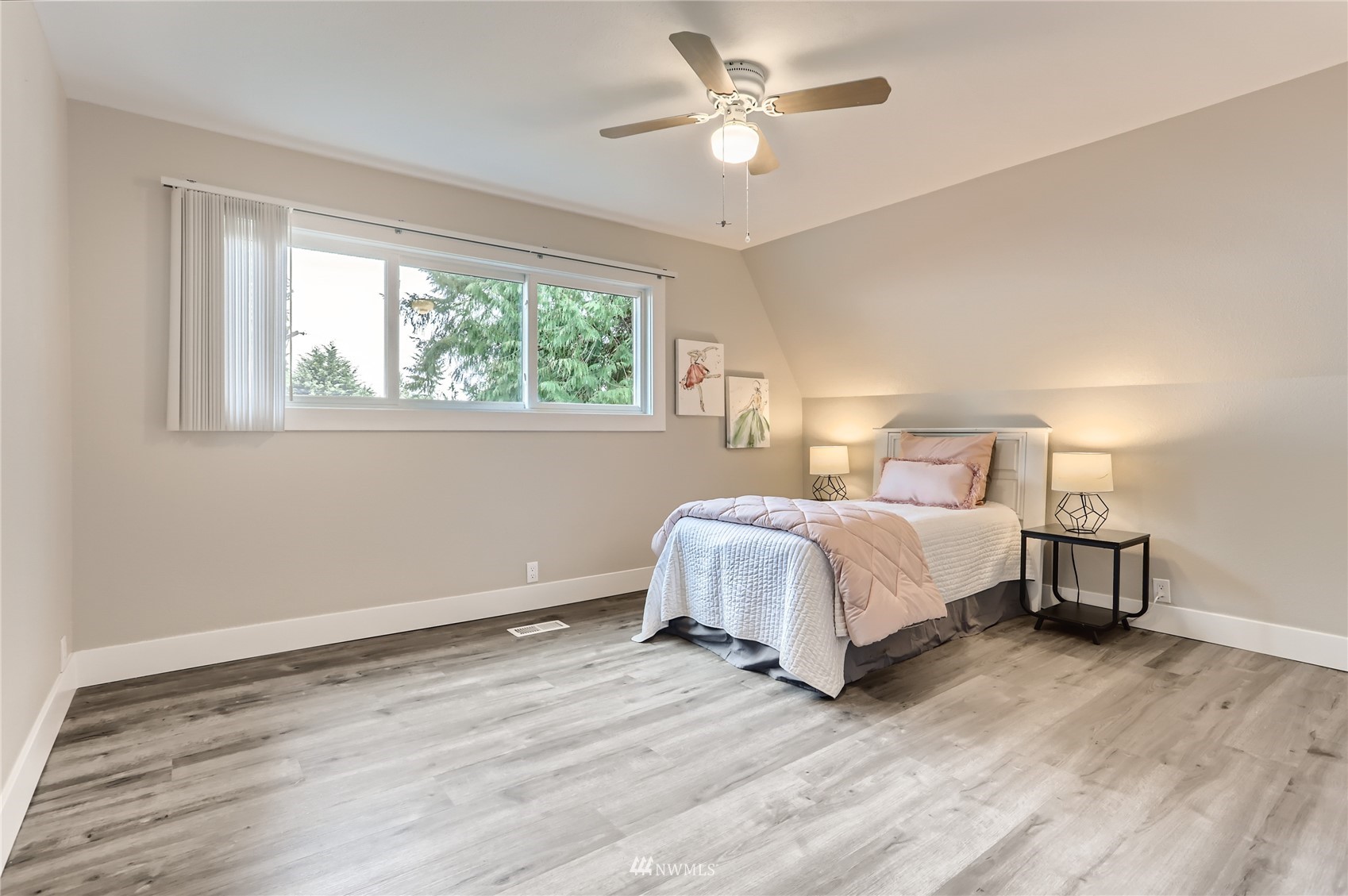 19810 43rd Avenue Southeast Bothell, WA 98012 - Photo 21 of 40 a bed room with a bed and a window