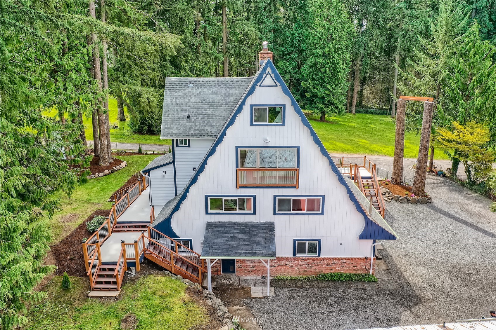 19810 43rd Avenue Southeast Bothell, WA 98012 - Photo 38 of 40 a view of a house with a yard