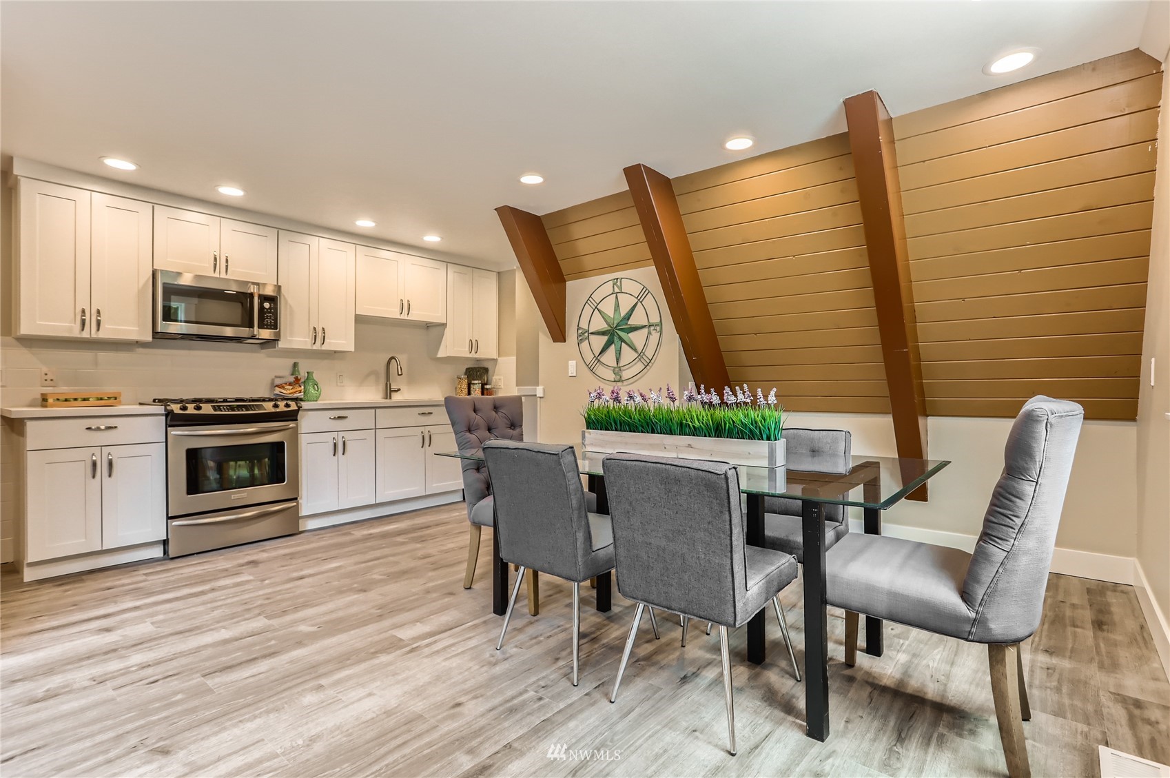 19810 43rd Avenue Southeast Bothell, WA 98012 - Photo 10 of 40 a view of kitchen with table and chairs