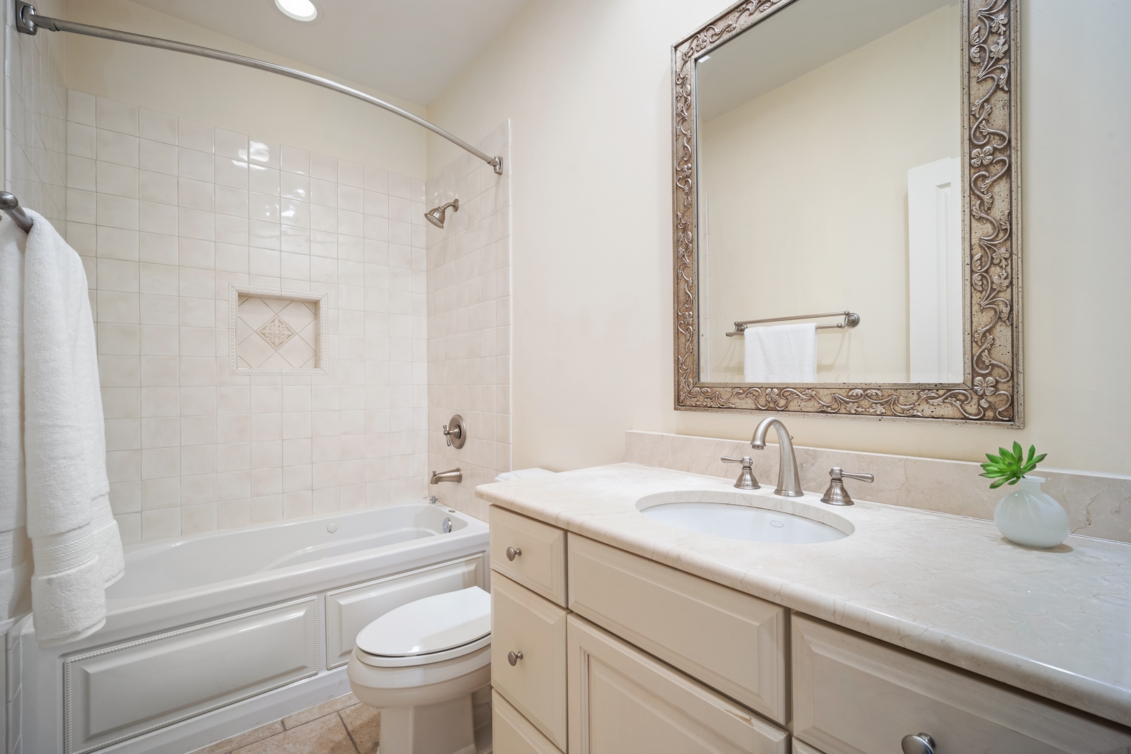 500 Deerfield Road Deerfield, IL 60015 - Photo 14 of 27 a bathroom with a sink a toilet and a large mirror