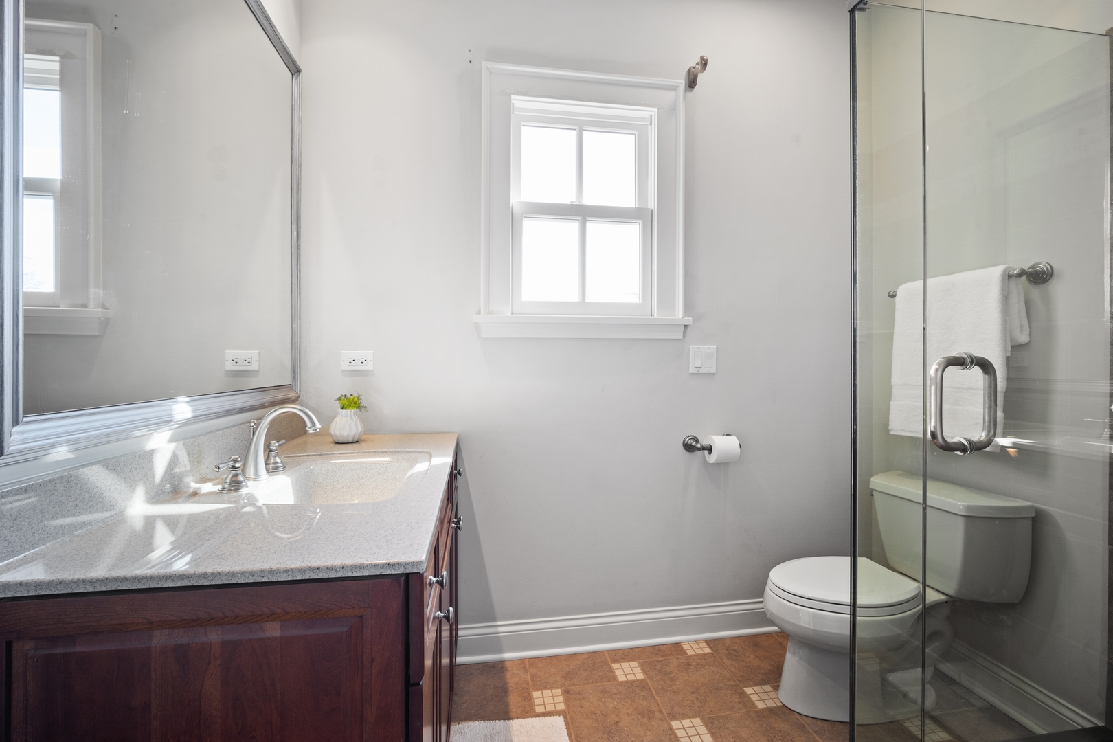 500 Deerfield Road Deerfield, IL 60015 - Photo 16 of 27 a bathroom with a granite countertop toilet sink and mirror