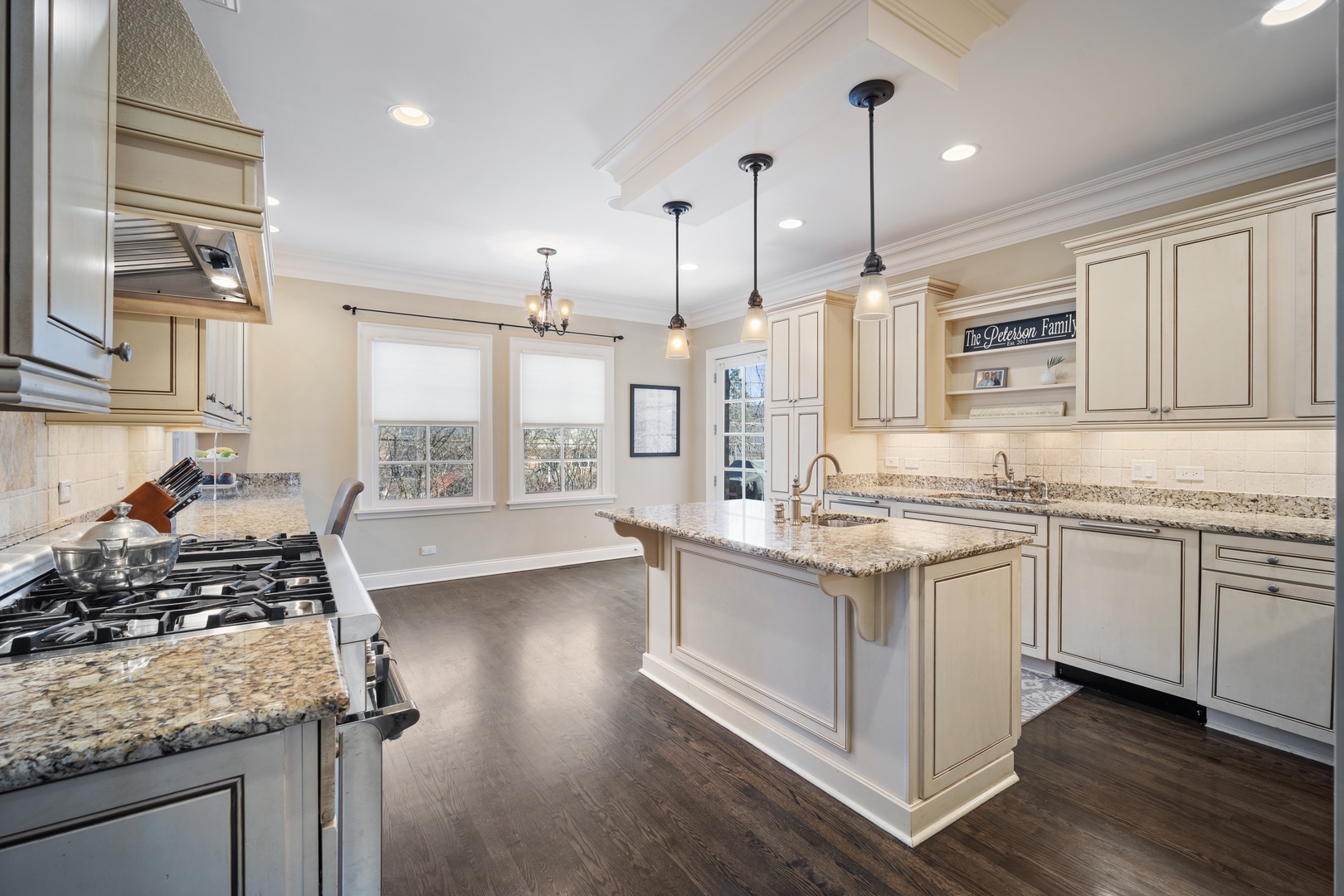 500 Deerfield Road Deerfield, IL 60015 - Photo 5 of 27 a kitchen with stainless steel appliances granite countertop a stove and a wooden floors
