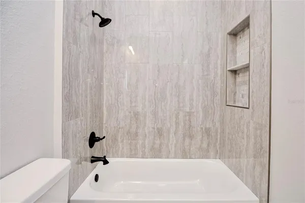 a view of small space with wooden floor