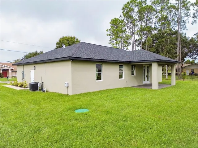 a house view with a garden space