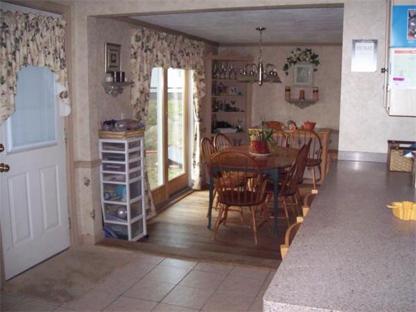1094 Trapelo Road Waltham, MA 02451 - Photo 5 of 8 a view of a dining room with furniture window and outside view