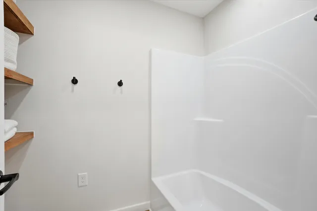 a bathroom with a bathtub