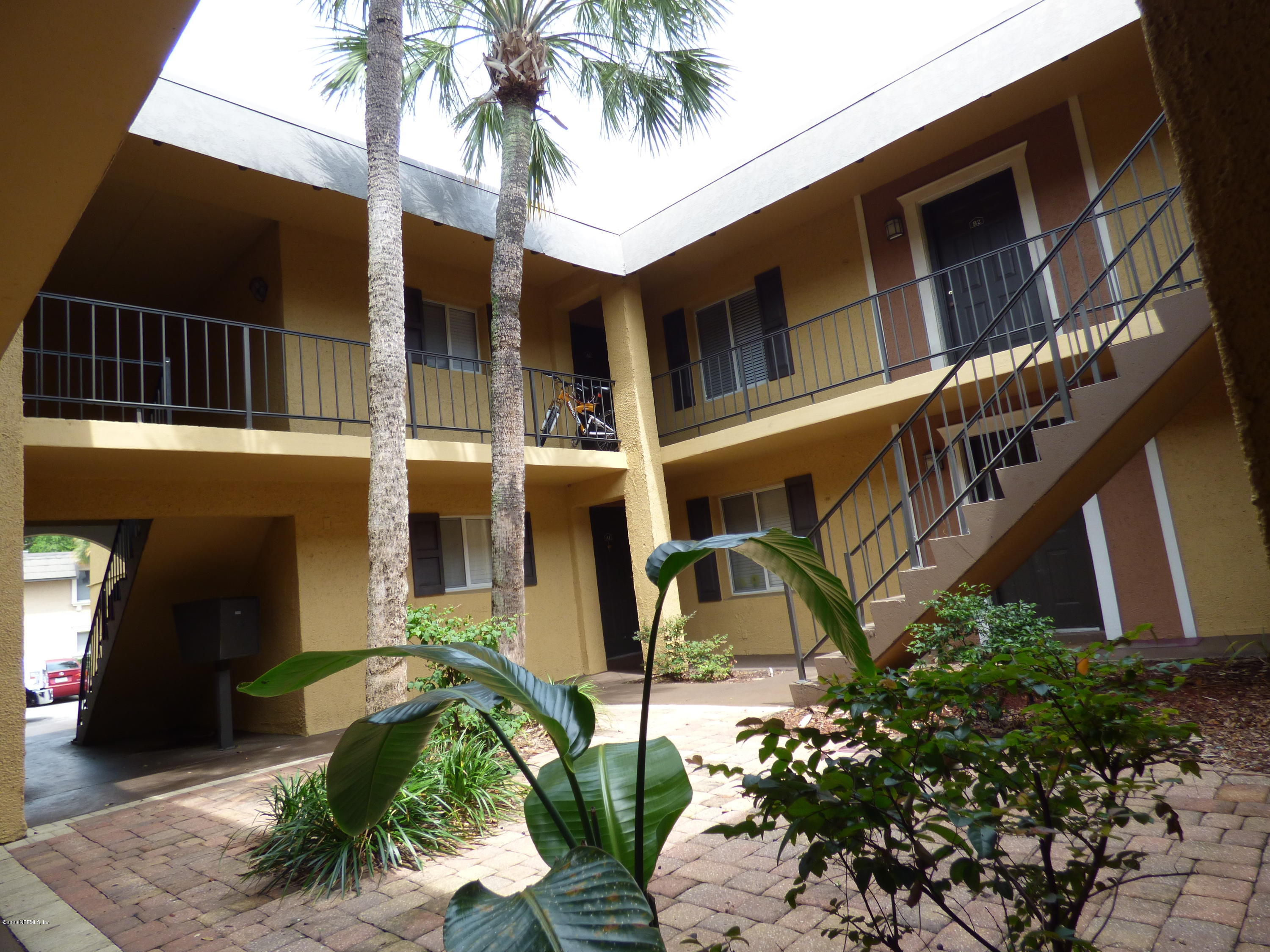 355 Monument Road, Unit 8 D2 Jacksonville, FL 32225 - Photo 13 of 19 a front view of a house with garden