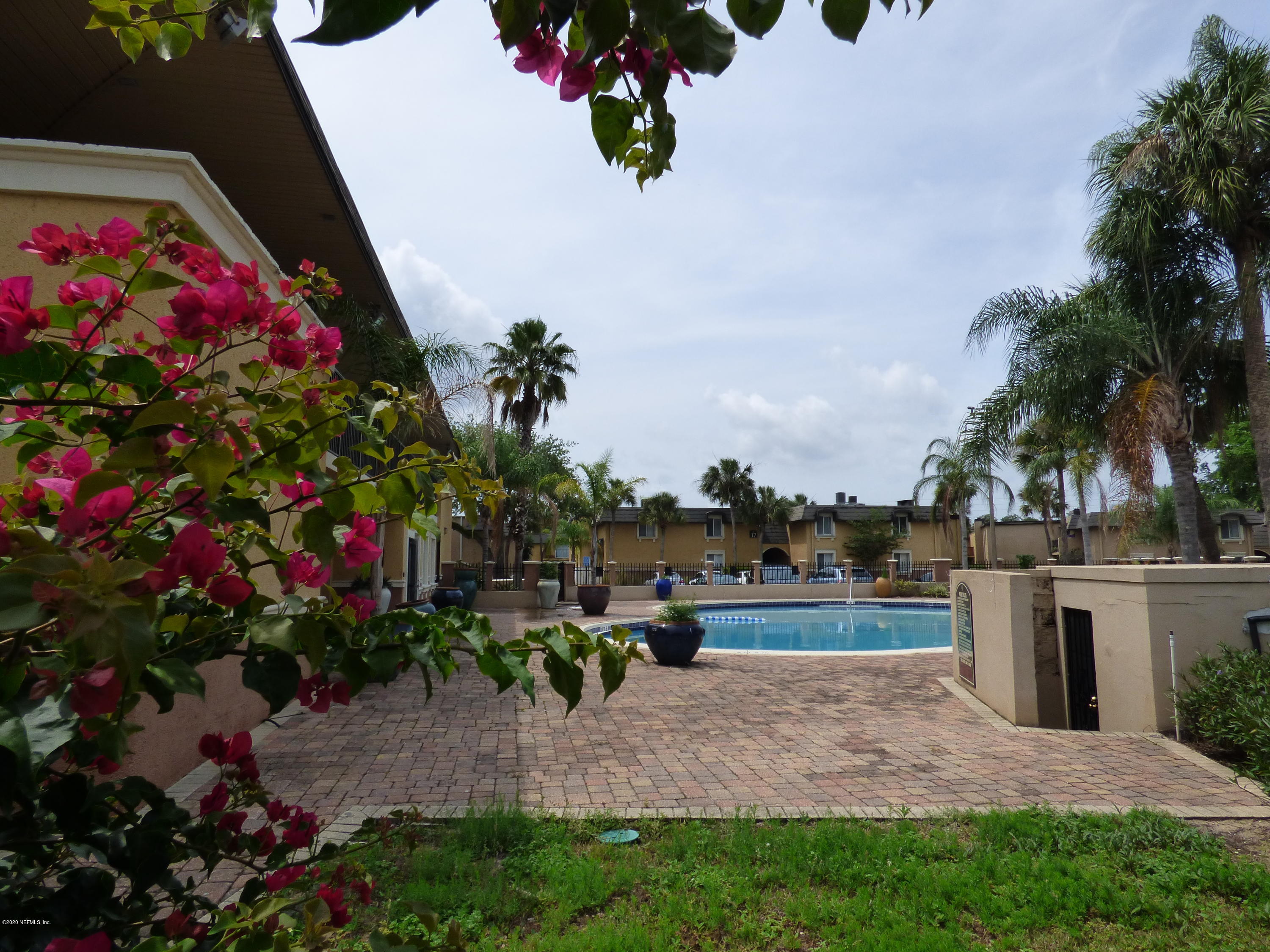 355 Monument Road, Unit 8 D2 Jacksonville, FL 32225 - Photo 15 of 19 a view of a backyard with sitting area