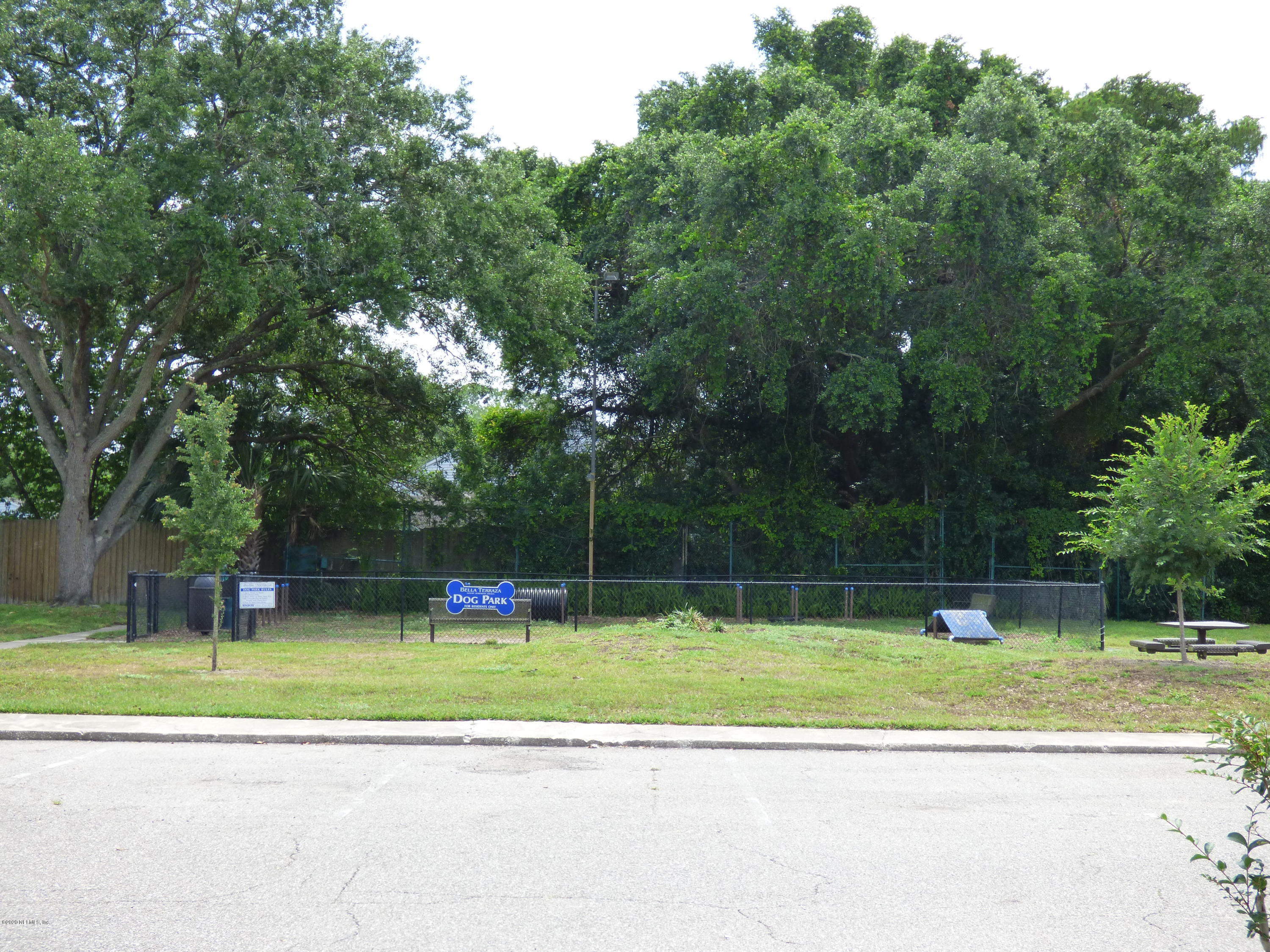 355 Monument Road, Unit 8 D2 Jacksonville, FL 32225 - Photo 17 of 19 a view of a park with large trees