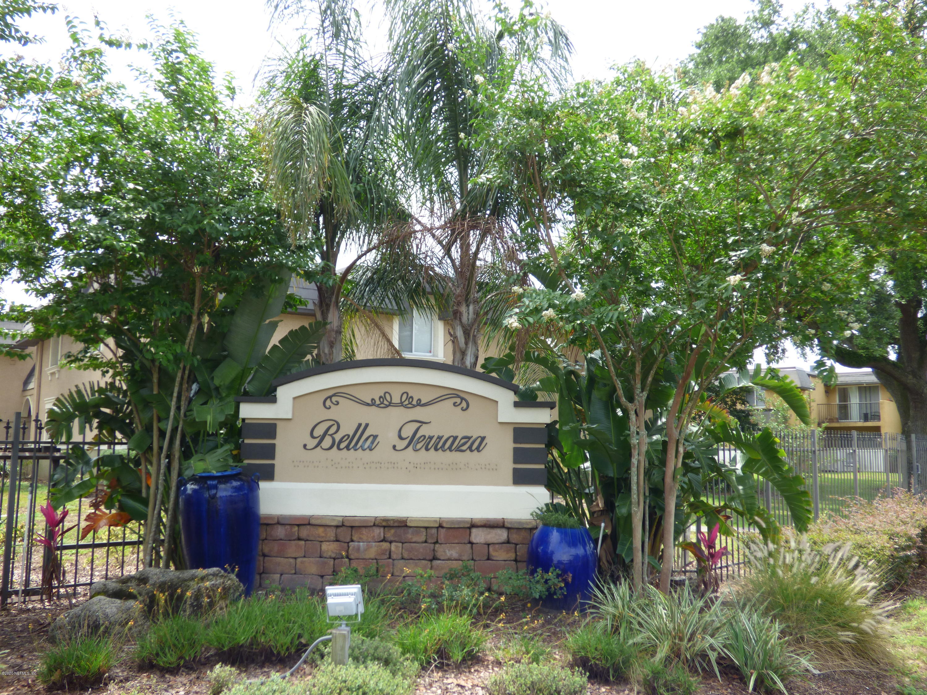 355 Monument Road, Unit 8 D2 Jacksonville, FL 32225 - Photo 19 of 19 a sign on the side of a road