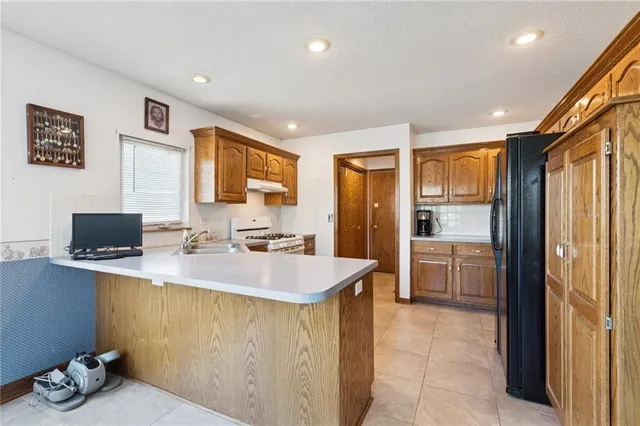 $310,000 | 8014 South Church Road, Pleasant Valley, MO 64068