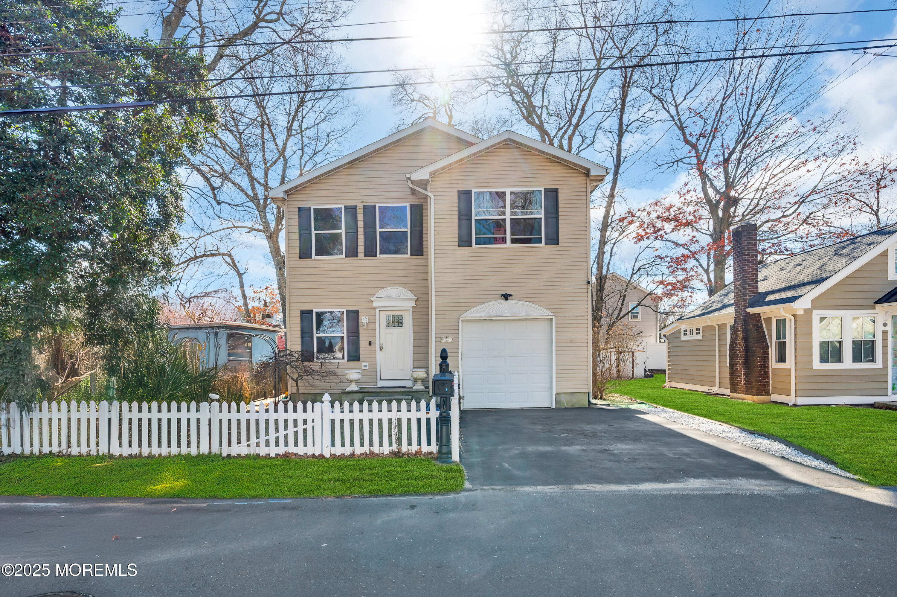 22 Liverpool Road Brick, NJ 08723 - Photo 1 of 36 a front view of a house with a garden