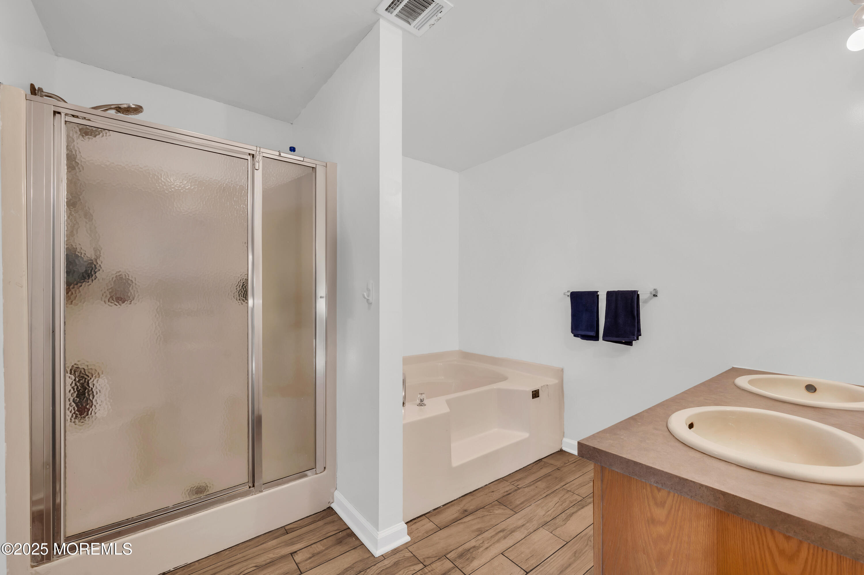 22 Liverpool Road Brick, NJ 08723 - Photo 20 of 36 a bathroom with a sink a toilet and shower