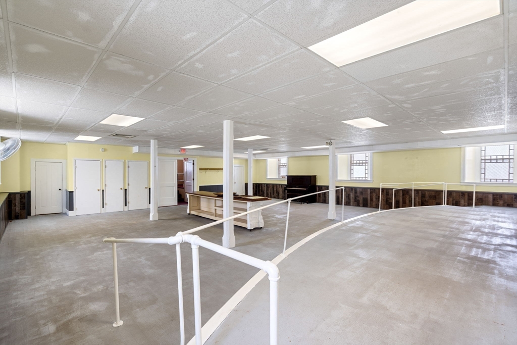 437 Main Street Southbridge, MA 01550 - Photo 14 of 31 a room with lots of table and chairs