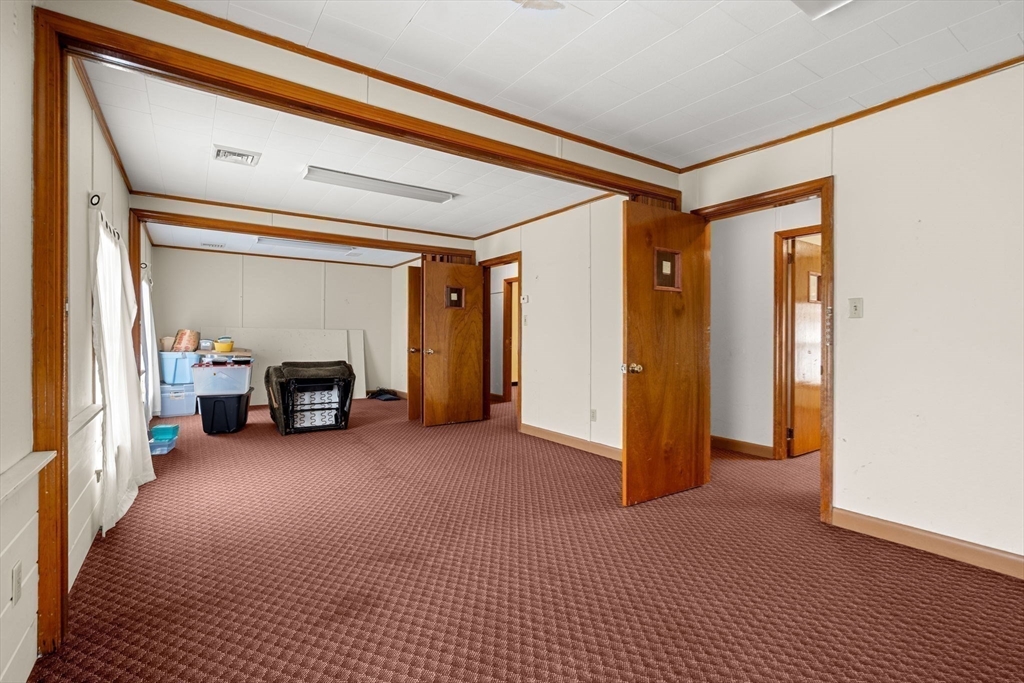 437 Main Street Southbridge, MA 01550 - Photo 20 of 31 a view of a room with a large window and a couch