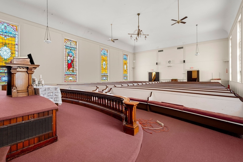 437 Main Street Southbridge, MA 01550 - Photo 9 of 31 a room with gym equipment and wooden floor