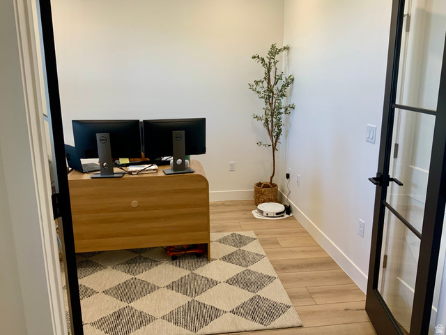 277 West 800 South Monroe, UT 84754 - Photo 10 of 46 Home office with light wood-style floors and baseboards