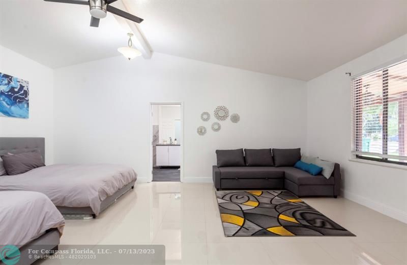 11450 Southwest 17th Street Davie, FL 33325 - Photo 19 of 56 a bedroom with furniture and a couch
