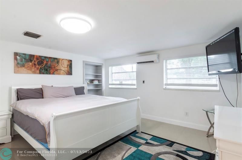 11450 Southwest 17th Street Davie, FL 33325 - Photo 33 of 56 a bedroom with a bed and a window