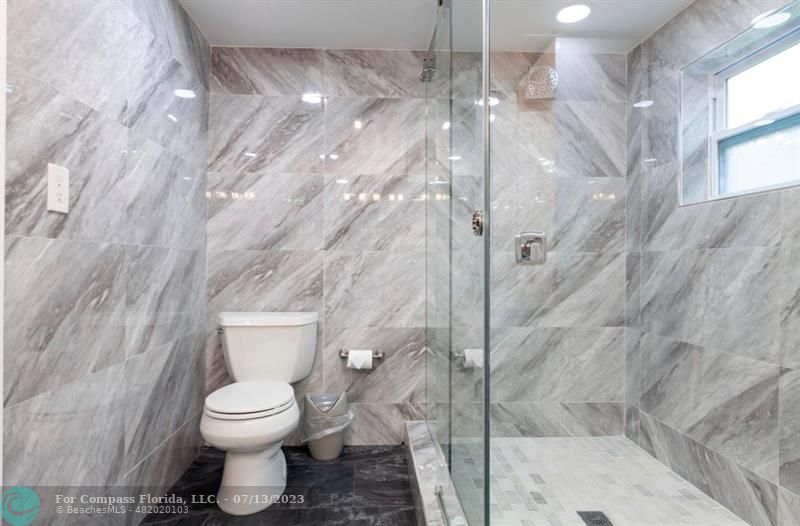 11450 Southwest 17th Street Davie, FL 33325 - Photo 37 of 56 a bathroom with a toilet and a shower