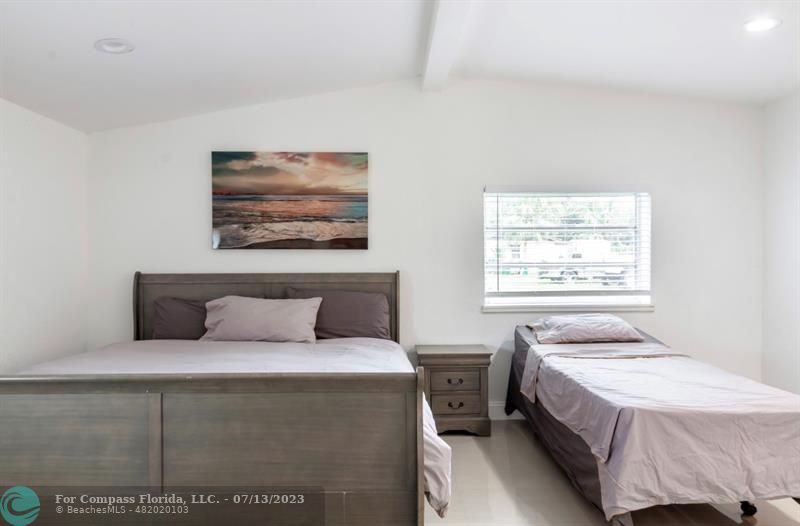 11450 Southwest 17th Street Davie, FL 33325 - Photo 45 of 56 a bedroom with a bed and window