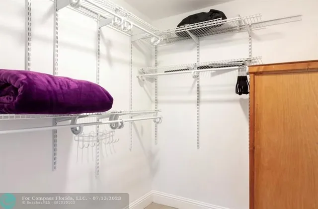 a view of a backyard with sitting area