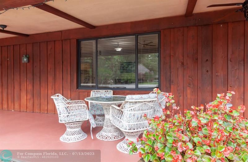 11450 Southwest 17th Street Davie, FL 33325 - Photo 48 of 56 a outdoor dining space with furniture
