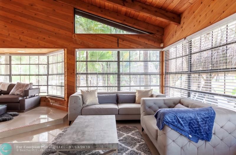 11450 Southwest 17th Street Davie, FL 33325 - Photo 5 of 56 a living room with furniture and a large window
