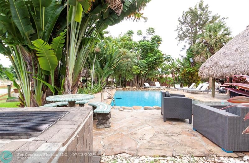 11450 Southwest 17th Street Davie, FL 33325 - Photo 52 of 56 a view of a backyard with sitting area