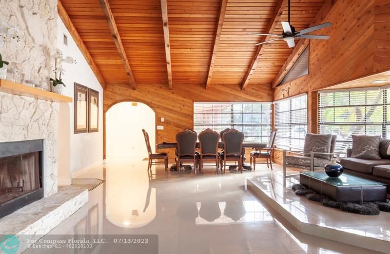 11450 Southwest 17th Street Davie, FL 33325 - Photo 8 of 56 a living room with furniture and a fireplace