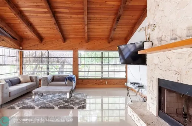 a view of a livingroom with furniture and window
