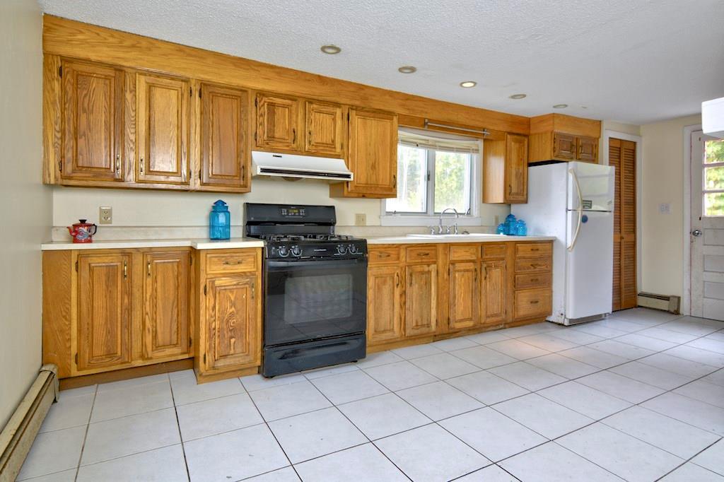 335 River Road Tenants Harbor, ME 04860 - Photo 5 of 12 Hard wood cabinets, tiled floors in...