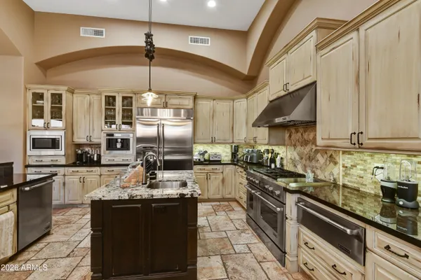 a view of a patio with couches chairs dining table and chairs