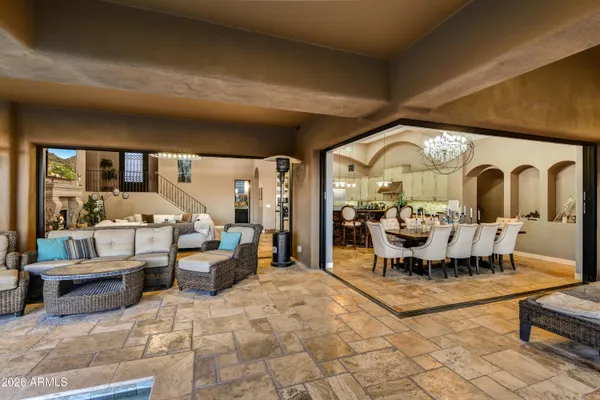 a living room with lots of furniture and a flat screen tv