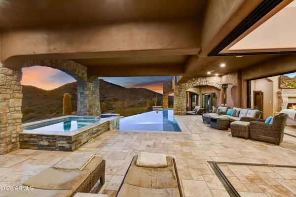 a living room with pool table and a table