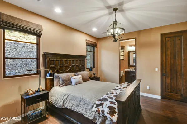 a picture of a room with a white wall and a large window