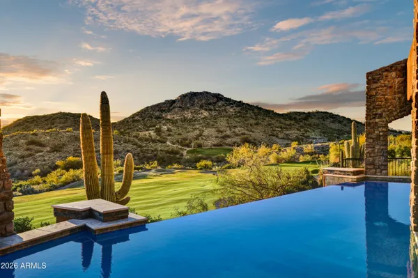 a view of a ocean with a mountain