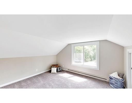 210 Palmer Road Monson, MA 01057 - Photo 19 of 26 a open living room with a couch and a window