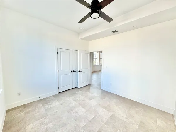 a kitchen with stainless steel appliances granite countertop a sink a stove and a wooden floors