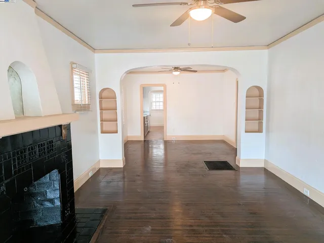 a view of livingroom with hardwood floor and a fireplace