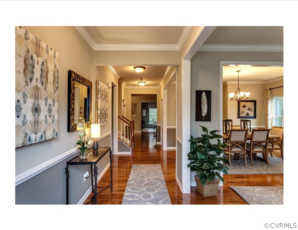1342 Braisden Road Midlothian, VA 23114 - Photo 2 of 19 a living room with furniture and a potted plant