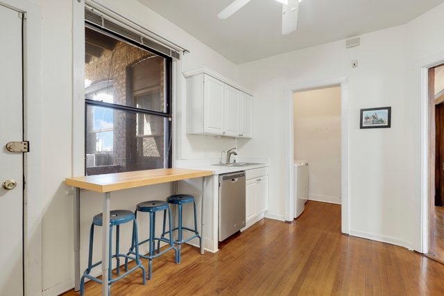 2961 North Halsted Street, Unit 3 Chicago, IL 60657 - Photo 17 of 19 a view of front door with hallway