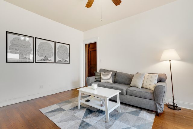 2961 North Halsted Street, Unit 3 Chicago, IL 60657 - Photo 5 of 19 a living room with furniture and wooden floor