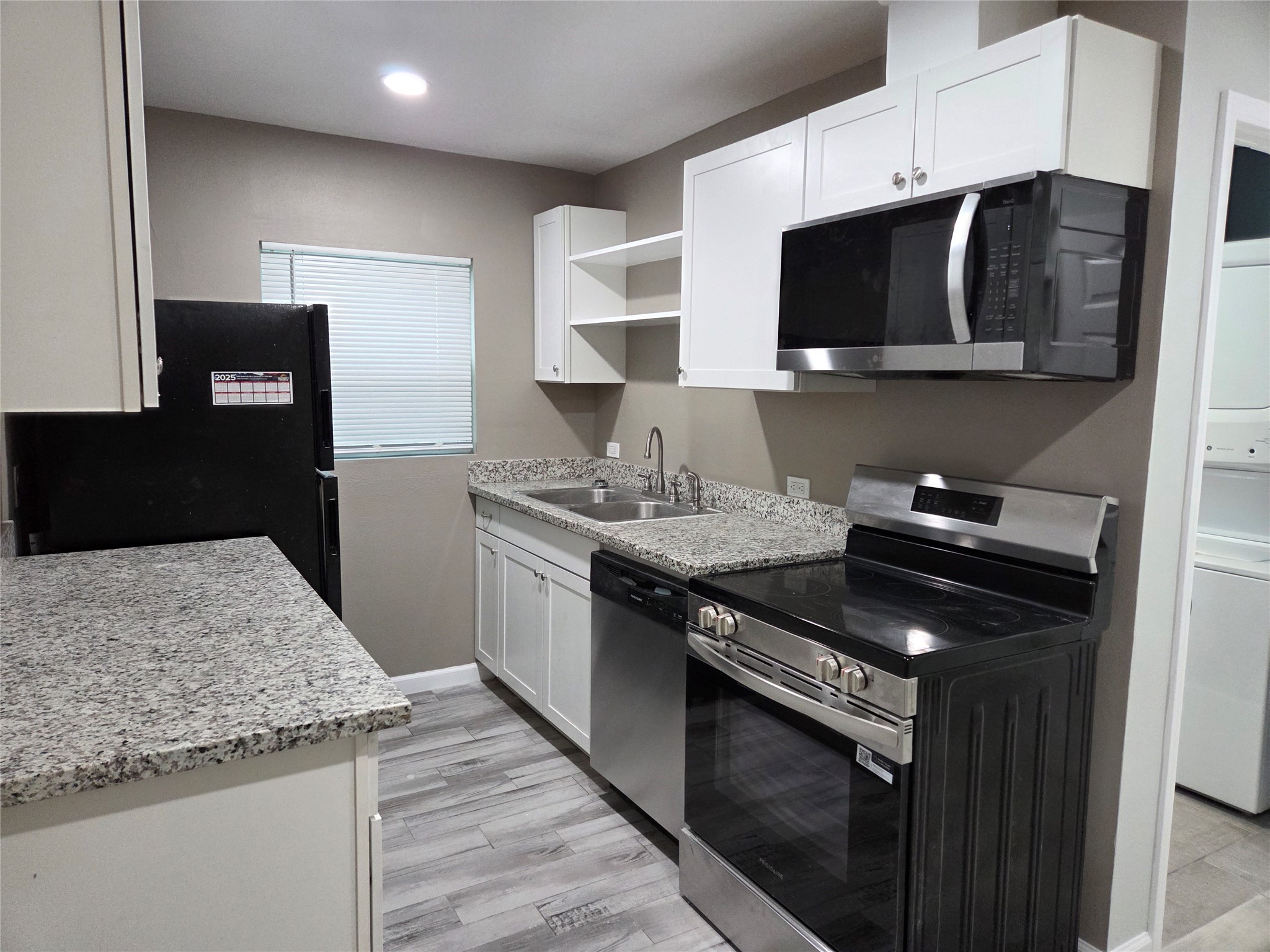 What a great apartment!  Brand new kitchen with granite counters, new stainless steel appliances, including a dishwasher.  Loads of cabinet space and shelving to store everything in your kitchen.
